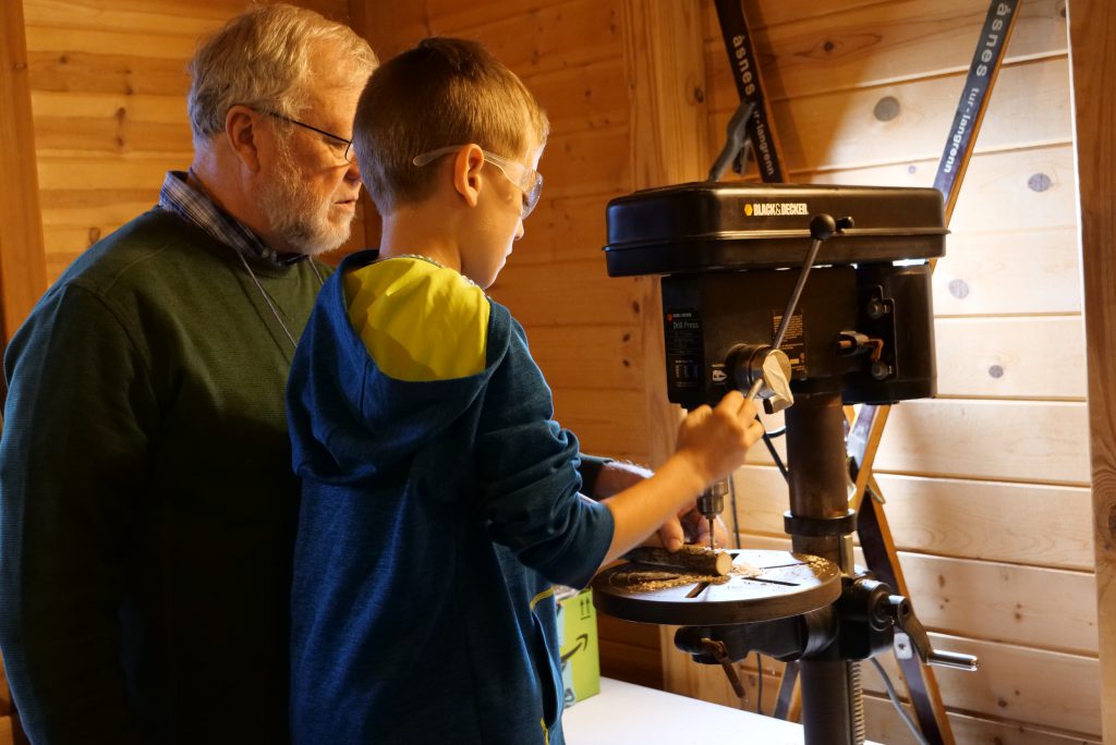 Wally assisting a participant at Gifts of Nature